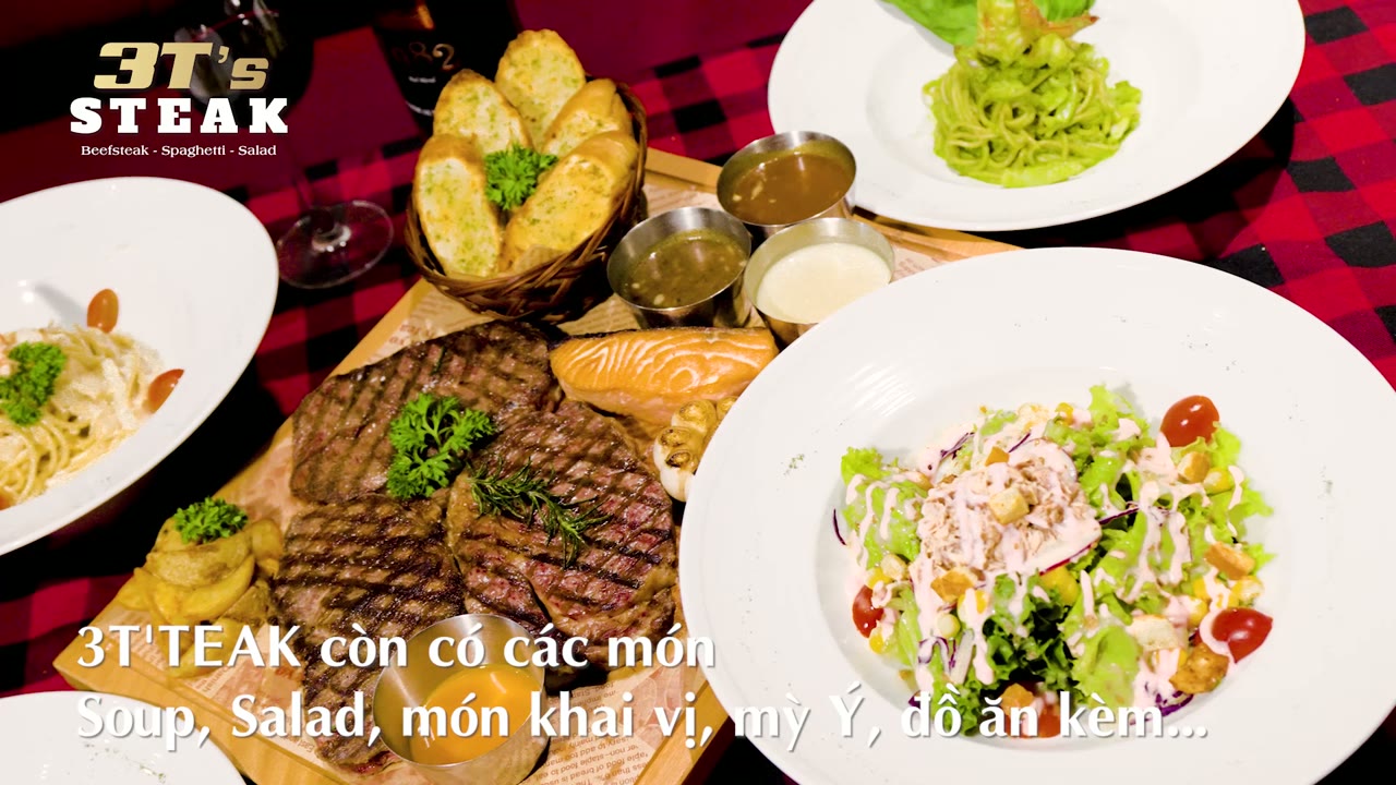 3T Steak spread with grilled steaks, salmon, pasta and salad
